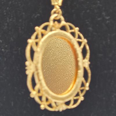 LOT 99: Multiple Gold-tone Necklaces and Chains and Pair of Earrings