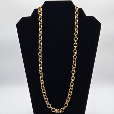 LOT 99: Multiple Gold-tone Necklaces and Chains and Pair of Earrings