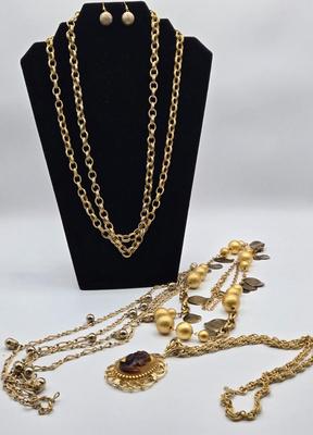 LOT 99: Multiple Gold-tone Necklaces and Chains and Pair of Earrings