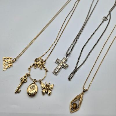 LOT 108: Multiple Necklaces, Chains, Charms, and More