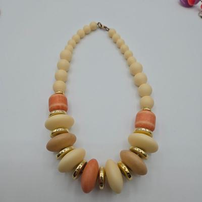 LOT 110: Multiple Necklaces with Matching Clip Earrings and More