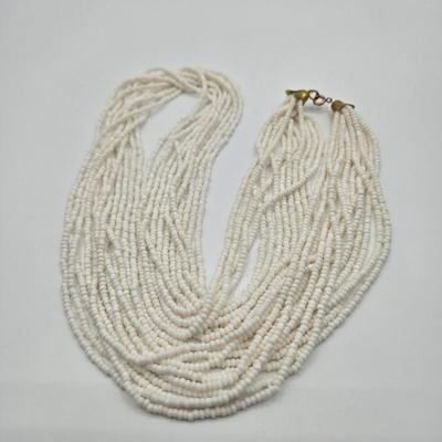 LOT 110: Multiple Necklaces with Matching Clip Earrings and More