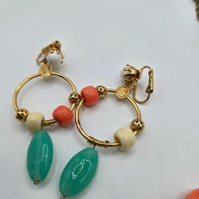 LOT 110: Multiple Necklaces with Matching Clip Earrings and More