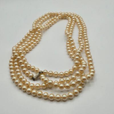 LOT 112: Vintage Faux Pearl Opera Length, Single Strand, Double Strand Neclaces, and Bracelet