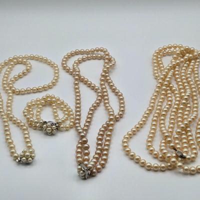 LOT 112: Vintage Faux Pearl Opera Length, Single Strand, Double Strand Neclaces, and Bracelet