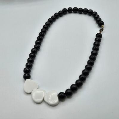 LOT 114: Vintage Jewelry Including Necklaces, Clip Earrings, and More