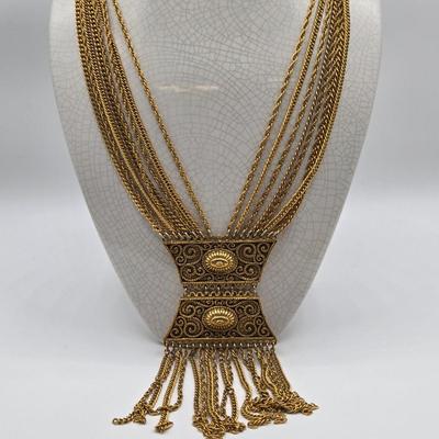 LOT 116: Gold-tone Multi Strand Necklace with Fringe, Multi Strand Necklace with Matching Bracelet, and Gold-tone Chain with Knot Charm