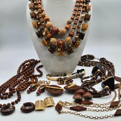 LOT 117: Multiple Wood-tone Necklaces and Clip Earrings