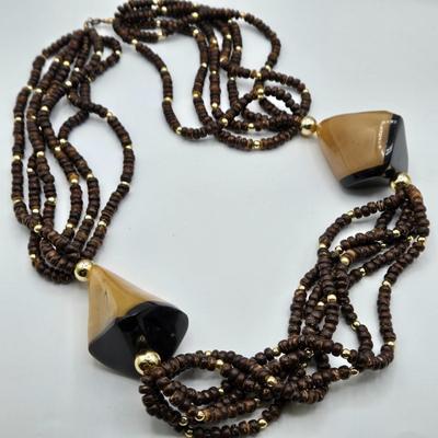 LOT 117: Multiple Wood-tone Necklaces and Clip Earrings