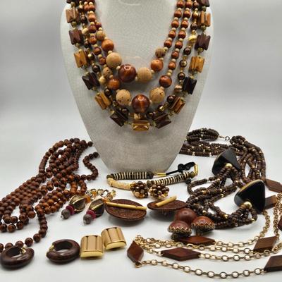 LOT 117: Multiple Wood-tone Necklaces and Clip Earrings
