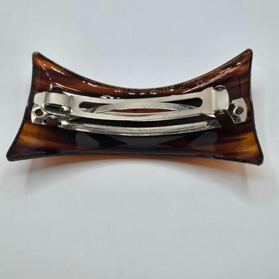 LOT 120: Fashionable Hair Combs, Barrett, Brooches with Matching Clip Earrings, and More
