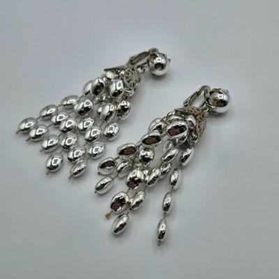 LOT 120: Fashionable Hair Combs, Barrett, Brooches with Matching Clip Earrings, and More