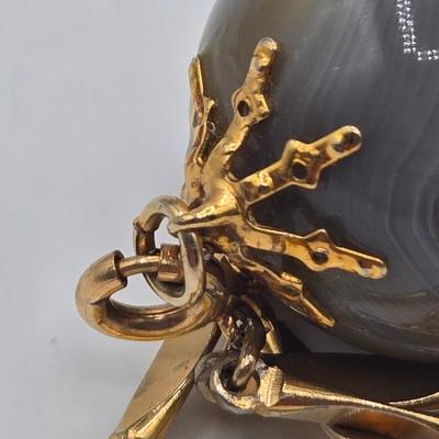 LOT 139: Two Round Polished Agate Pendants on Gold-tone Chains