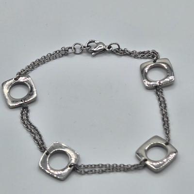 LOT 142: Multiple Pieces of Silver-tone Jewelry Including Rose Quartz Necklace, Lucite Block Necklace, Fun Turtle Necklace, and More