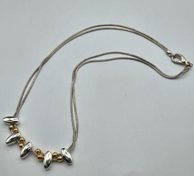 LOT 142: Multiple Pieces of Silver-tone Jewelry Including Rose Quartz Necklace, Lucite Block Necklace, Fun Turtle Necklace, and More