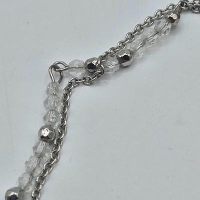 LOT 142: Multiple Pieces of Silver-tone Jewelry Including Rose Quartz Necklace, Lucite Block Necklace, Fun Turtle Necklace, and More