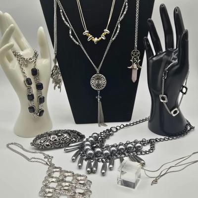 LOT 142: Multiple Pieces of Silver-tone Jewelry Including Rose Quartz Necklace, Lucite Block Necklace, Fun Turtle Necklace, and More
