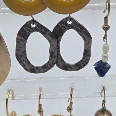 LOT 145: Multiple Pairs of Pierced Earrings