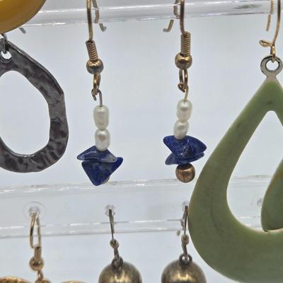 LOT 145: Multiple Pairs of Pierced Earrings