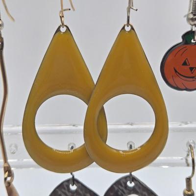 LOT 145: Multiple Pairs of Pierced Earrings
