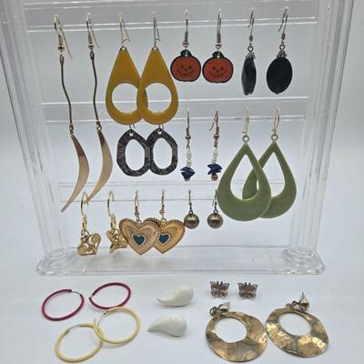 LOT 145: Multiple Pairs of Pierced Earrings