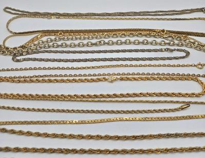LOT 146: Numerous Gold-tone Chains, Variety of Charms & Pendants, and Three Pairs of Pierced Earrings