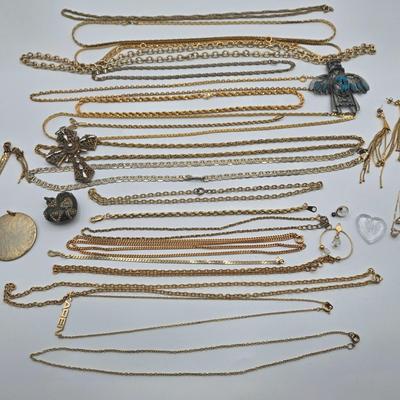 LOT 146: Numerous Gold-tone Chains, Variety of Charms & Pendants, and Three Pairs of Pierced Earrings