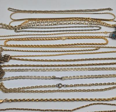 LOT 146: Numerous Gold-tone Chains, Variety of Charms & Pendants, and Three Pairs of Pierced Earrings
