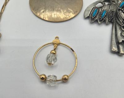 LOT 146: Numerous Gold-tone Chains, Variety of Charms & Pendants, and Three Pairs of Pierced Earrings