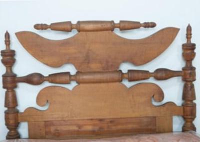 Sale Photo Thumbnail #1496: Four post wooden rope bed with acorn finials and rolling pin headboard and footboard. Metal hardware screw-in side rail construction. Designed for settlers traveling by covered wagon, a rope lattice work to support a down filled mattress. This bed does co