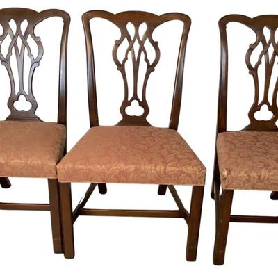 Sale Photo Thumbnail #1581: Kittinger Chippendale chairs are high-quality reproductions of 18th-century Chippendale furniture, known for their elegance and craftsmanship. These chairs are made by the Kittinger Furniture Company, which has a long history of producing fine furniture i