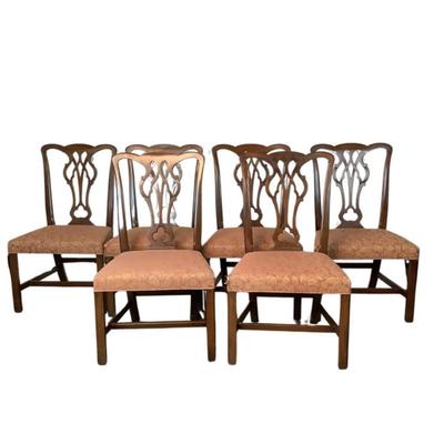 Sale Photo Thumbnail #1577: Kittinger Chippendale chairs are high-quality reproductions of 18th-century Chippendale furniture, known for their elegance and craftsmanship. These chairs are made by the Kittinger Furniture Company, which has a long history of producing fine furniture i