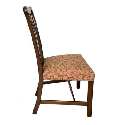 Sale Photo Thumbnail #1583: Kittinger Chippendale chairs are high-quality reproductions of 18th-century Chippendale furniture, known for their elegance and craftsmanship. These chairs are made by the Kittinger Furniture Company, which has a long history of producing fine furniture i