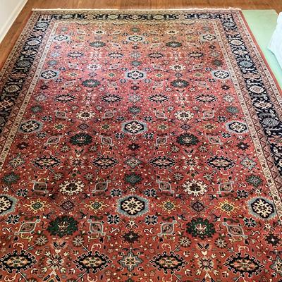 Sale Photo Thumbnail #1619: One end of the rug is sun faded. Rug isn't good condition other than the one side of fading. Measures 14 feet long by 9'10" wide.