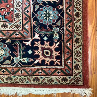 Sale Photo Thumbnail #1622: One end of the rug is sun faded. Rug isn't good condition other than the one side of fading. Measures 14 feet long by 9'10" wide.