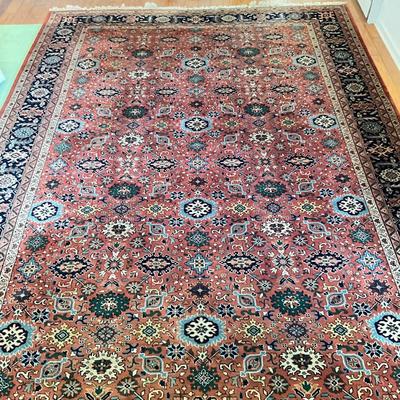 Sale Photo Thumbnail #1620: One end of the rug is sun faded. Rug isn't good condition other than the one side of fading. Measures 14 feet long by 9'10" wide.