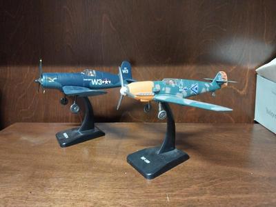 TWO MODEL PLANES ON STANDS