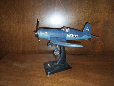 TWO MODEL PLANES ON STANDS