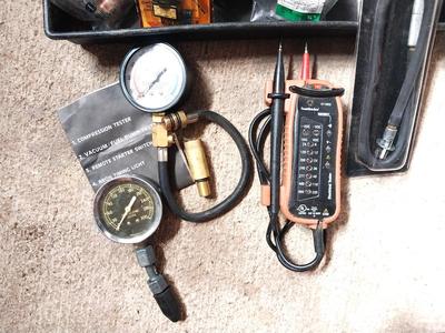 VARIETY OF AUTO REPAIR ITEMS IN CARRY TOOLBOX