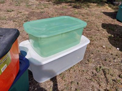 FOUR STORAGE TOTES