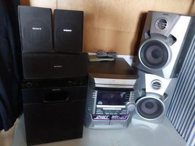 SONY PLAYER WITH SURROUND SOUND SPEAKERS