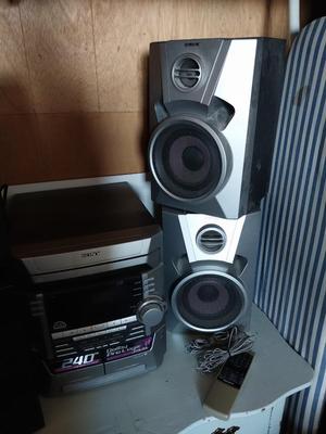 SONY PLAYER WITH SURROUND SOUND SPEAKERS