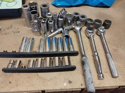 ASSORTMENT OF SOCKETS AND SOCKET WRENCHES