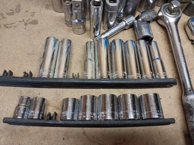 ASSORTMENT OF SOCKETS AND SOCKET WRENCHES