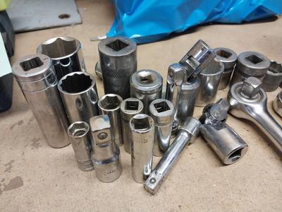 ASSORTMENT OF SOCKETS AND SOCKET WRENCHES