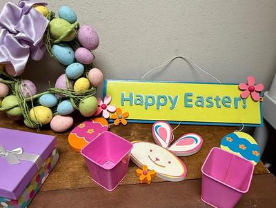 Sale Photo Thumbnail #366: Wreath made with colored eggs, hanging signs, metal baskets, boxes and more.