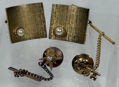 Sale Photo Thumbnail #259: Cufflinks have a pearl on each one, tie pins are a gold-tone key and a gold tone starburst.