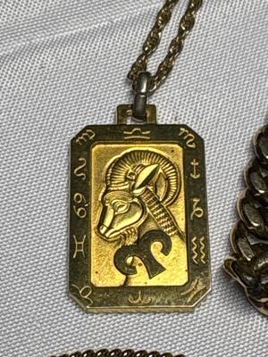 Sale Photo Thumbnail #86: Includes watchband, two bracelets, necklace, and pendant