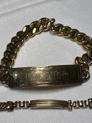 Sale Photo Thumbnail #88: Includes watchband, two bracelets, necklace, and pendant