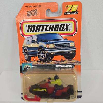 LOT 84: Matchbox Cars Including Snowmobile